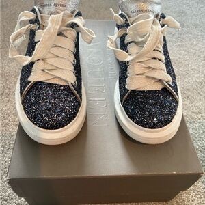 Alexander McQueen Black and White Sneakers Fashion-Forward Design